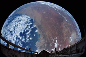 The Earth as seen from orbit, filmed in space by an IMAX camera aboard a NASA space convey goal in Dec 1988. 