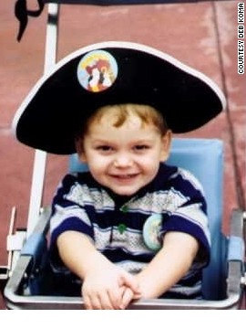 Deb Koma initial took her son Alex to Disney World in 1994, when he was usually two. That's him wearing a bandit hat. Some travelers are not so fervent for all Disney has to offer.